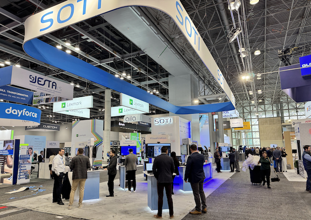 Picture of SOTI Employees at SOTI NRF booth